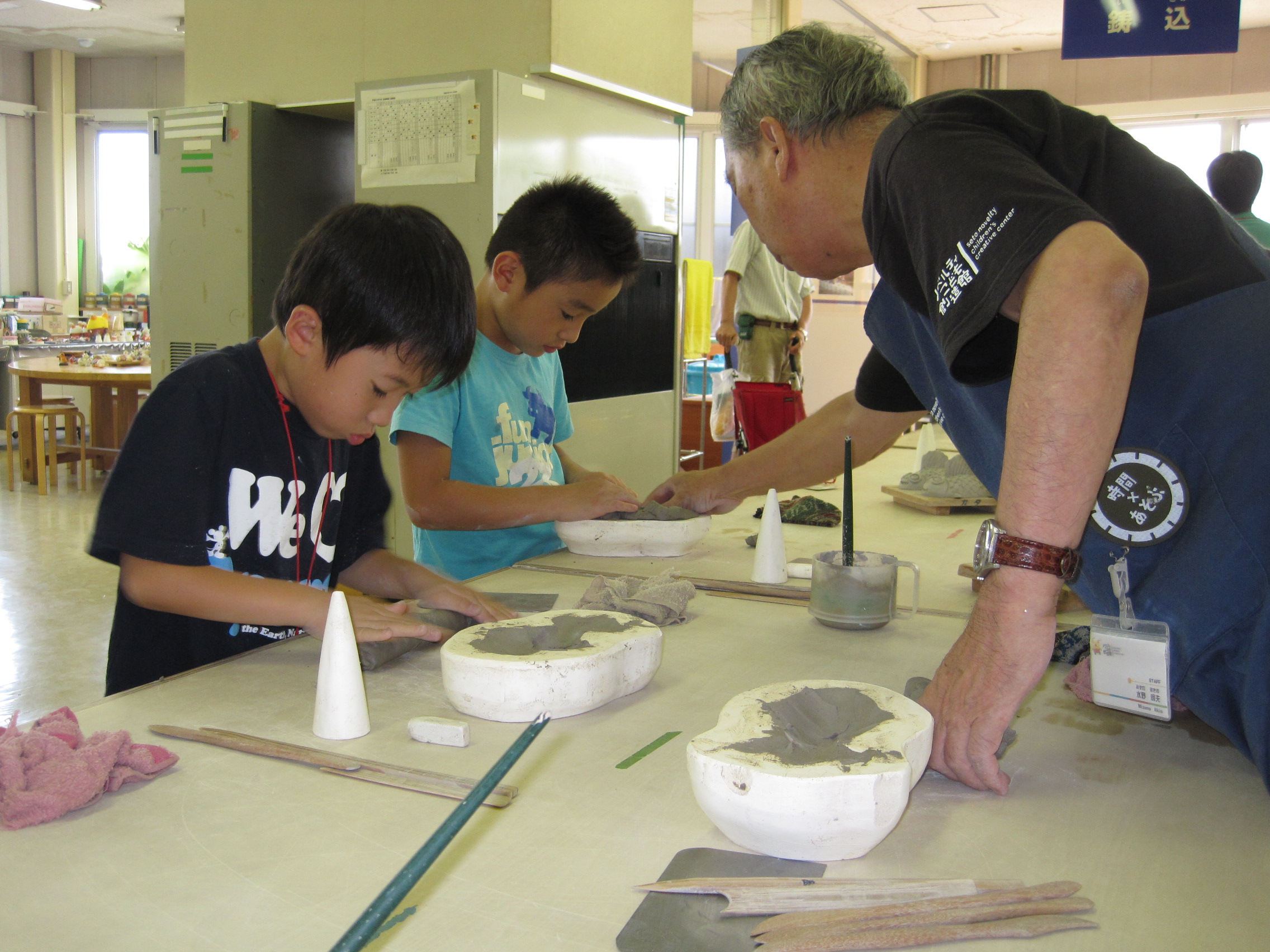 A variety of creative programs for children with a focus on clay_image